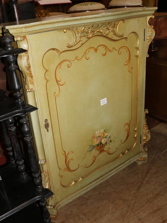 A Venetian style gilt and pale green painted shallow cupboard